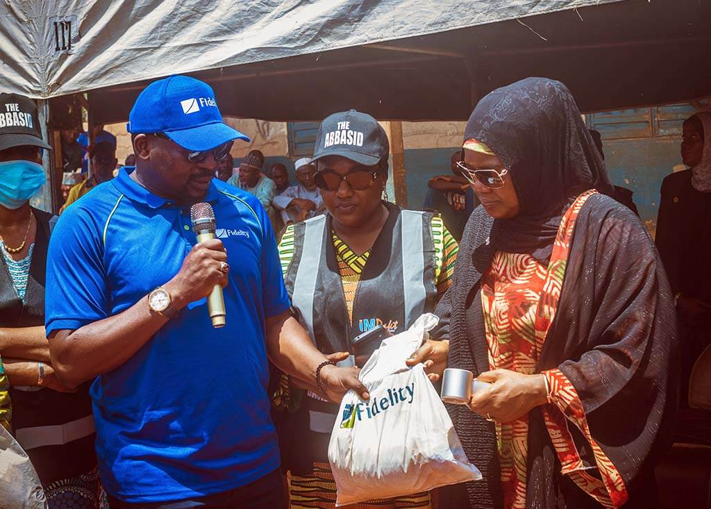L-R: Branch Leader, Minna, Fidelity Bank Plc, Mustapha Abubakar; Her Excellency, First Lady of Niger State, Hajiya Fatima Umaru Bago; and the CEO, ABBASID (a Fidelity Food Bank partner), Hajiya Hauwa Abbas; at the Fidelity Food Bank Distribution in Mokwa, Niger State recently