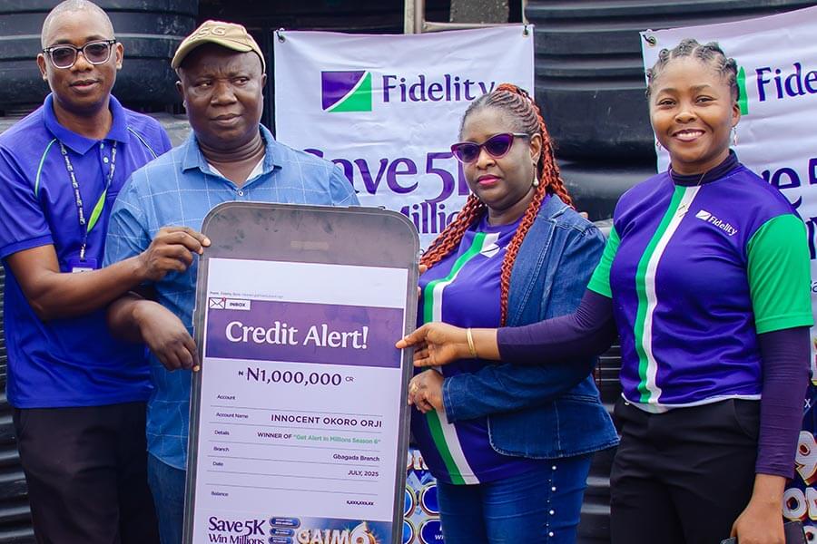 L – R: Direct Sales Executive, Fidelity Bank Plc, Adegboyega Ademokunwa; GAIM 6 Eight Monthly draw Winner, Innocent Okoro Orji; Branch Leader, Fidelity Bank Plc, Gbagada, Chinwe Umez-Eronini; and Product Manager, Savings, Fidelity Bank Plc, at the GAIM 6 prize presentation ceremony held at Gbagada Building Materials market in Lagos recently.